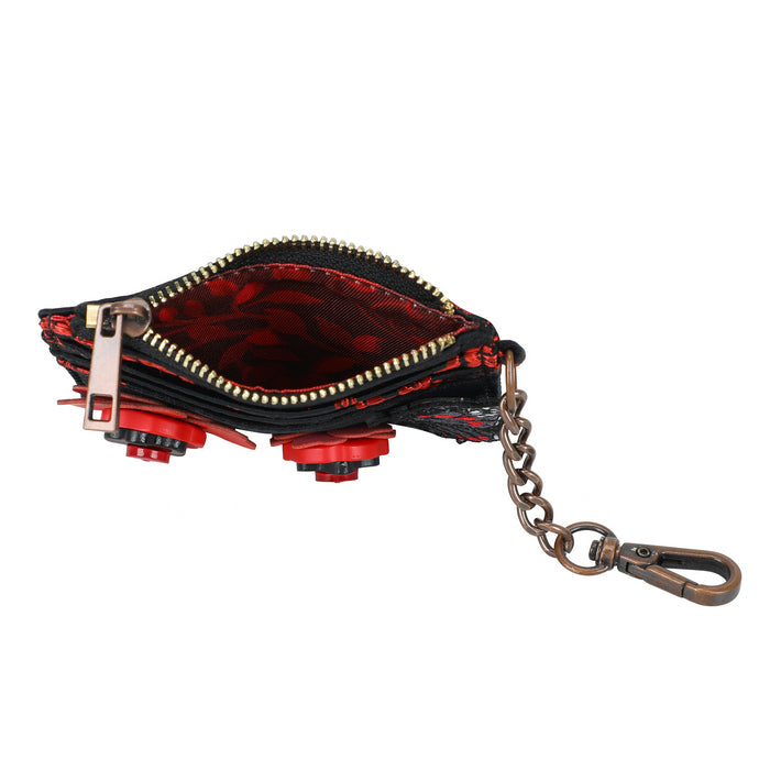 Red and black wallet with zipper and keychain on a white background