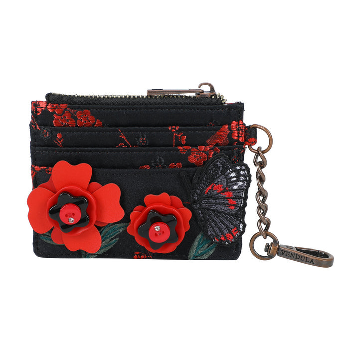 Black wallet with red floral designs and a butterfly, featuring a keychain, on a white background.