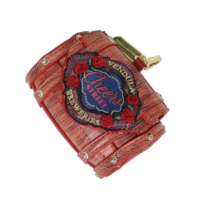 Decorative item with a label and roses on a white background