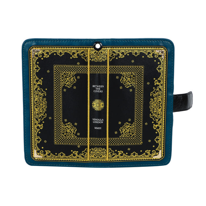 Decorative black book with gold detailing on a white background