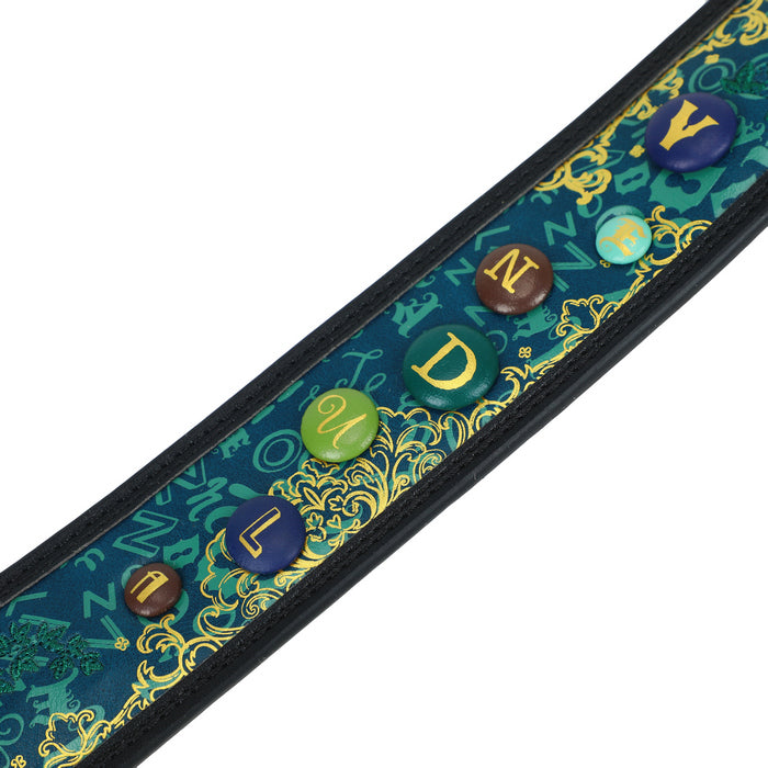 Decorative belt with colorful buttons and intricate patterns on a white background