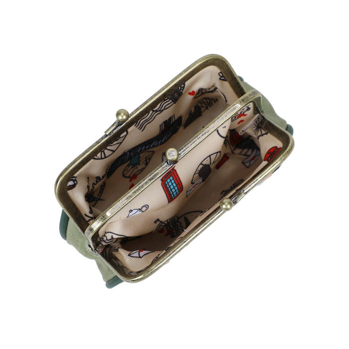 Small suitcase with a patterned interior on a white background