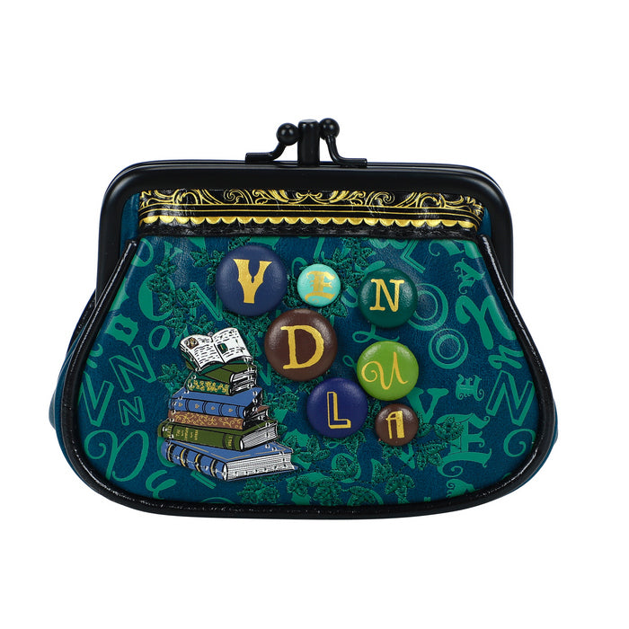Small pouch with decorative buttons and book design on a green background