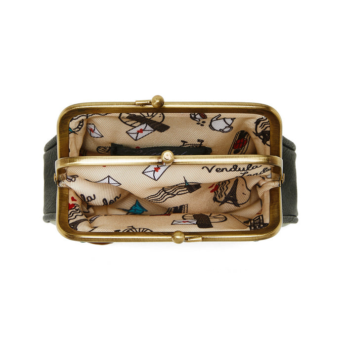 Small clutch bag with gold clasp and patterned interior on a white background
