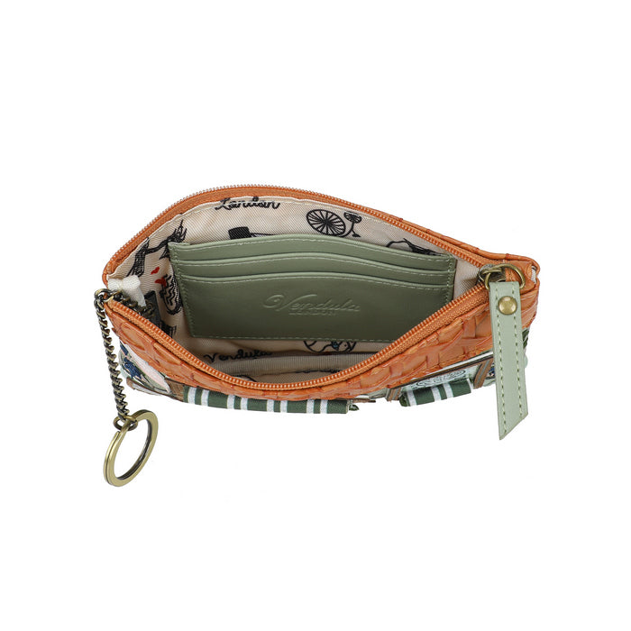 Small orange purse with a keychain on a white background