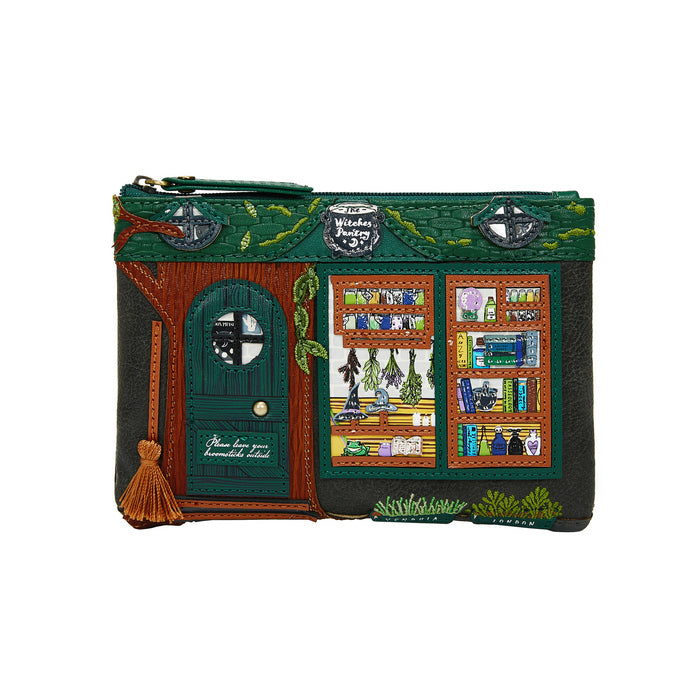 Pouch designed like a witch's house with a door and bookshelf window on a white background