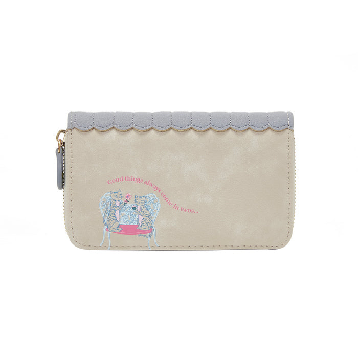 Small beige pouch with scalloped edge and cat illustration on a white background