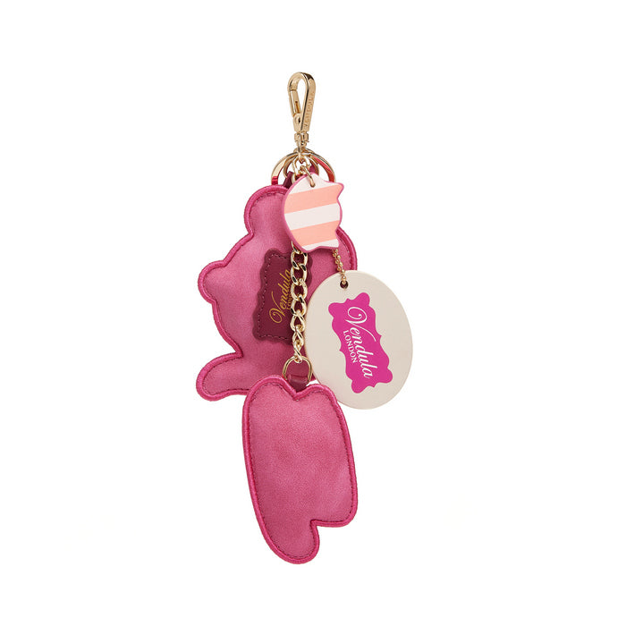 Pink keychain with gold accents on a white background