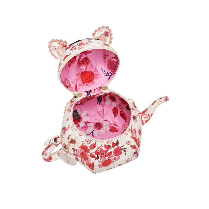 Floral-patterned teapot-shaped bag with a pink interior on a white background