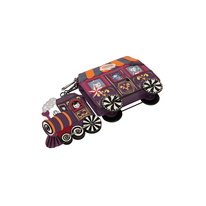 Colorful train-shaped keychain with decorative elements on a white background
