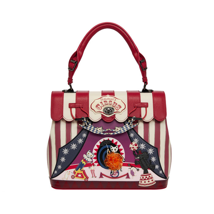 Vintage-style circus-themed handbag with red, white, and purple colors on a white background