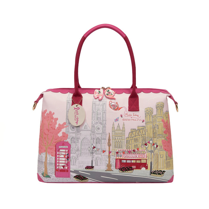 Handbag with London-themed design on a white background