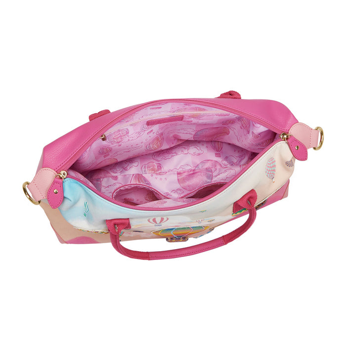 Pink children's bag with a floral pattern on a white background