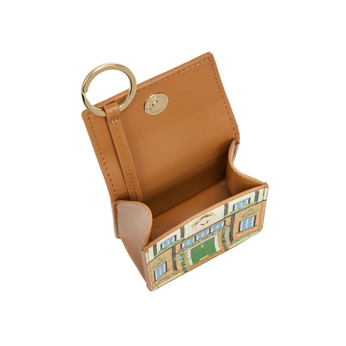 Tan leather cardholder with geometric pattern on a white background