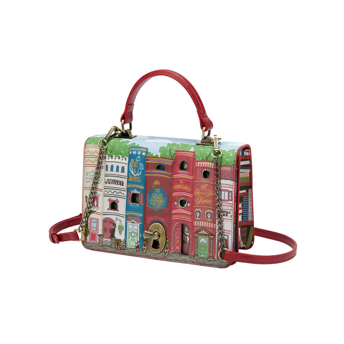 Handbag with colorful architectural design on a white background