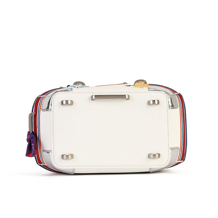 The back view of a white leather handbag with silver-tone hardware and a red, white, and blue striped fabric strap, shown on a plain white background.