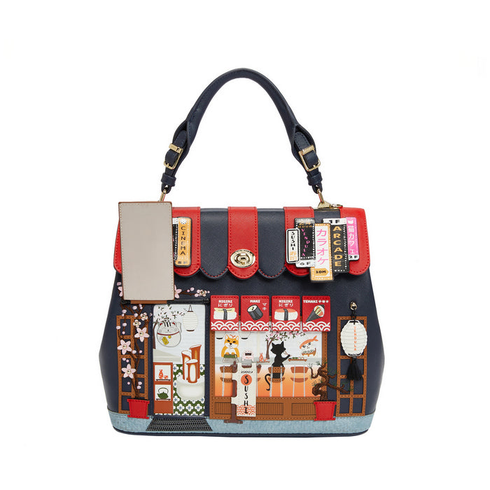 Multicolored handbag with decorative elements on a white background