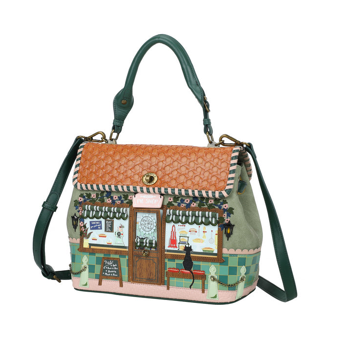Handbag with a cat-themed design on a white background