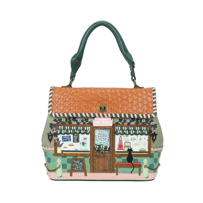 Handbag with a detailed design of a cafe scene on a white background