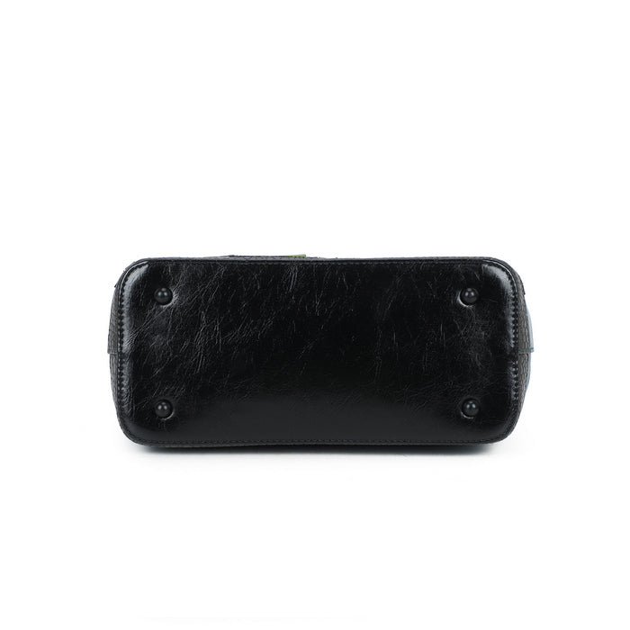 Black leather clutch bag on a white background