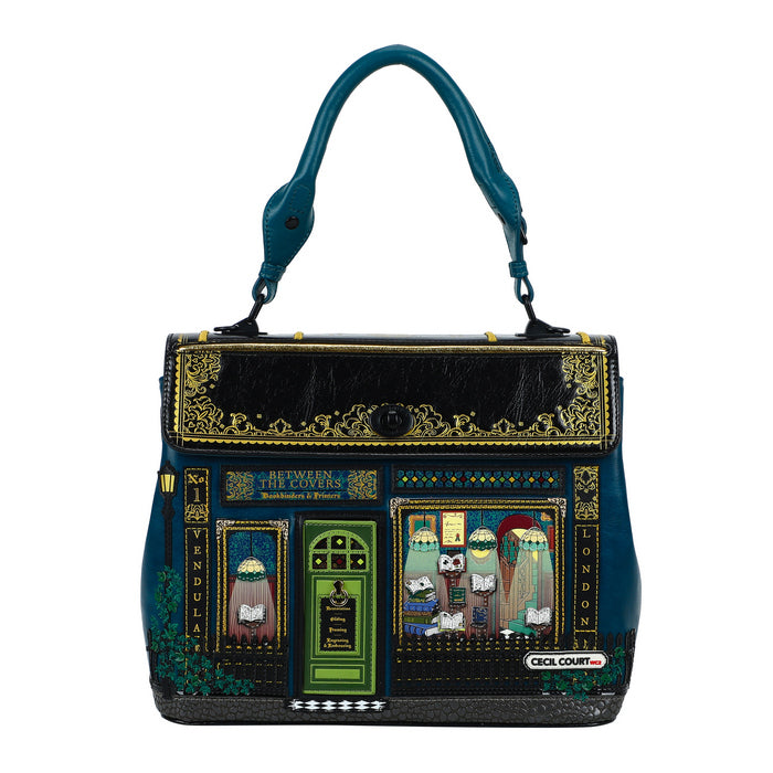 Decorative handbag with artistic designs and text on a white background
