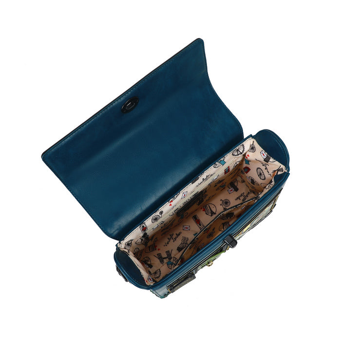Blue handbag with a patterned interior on a white background