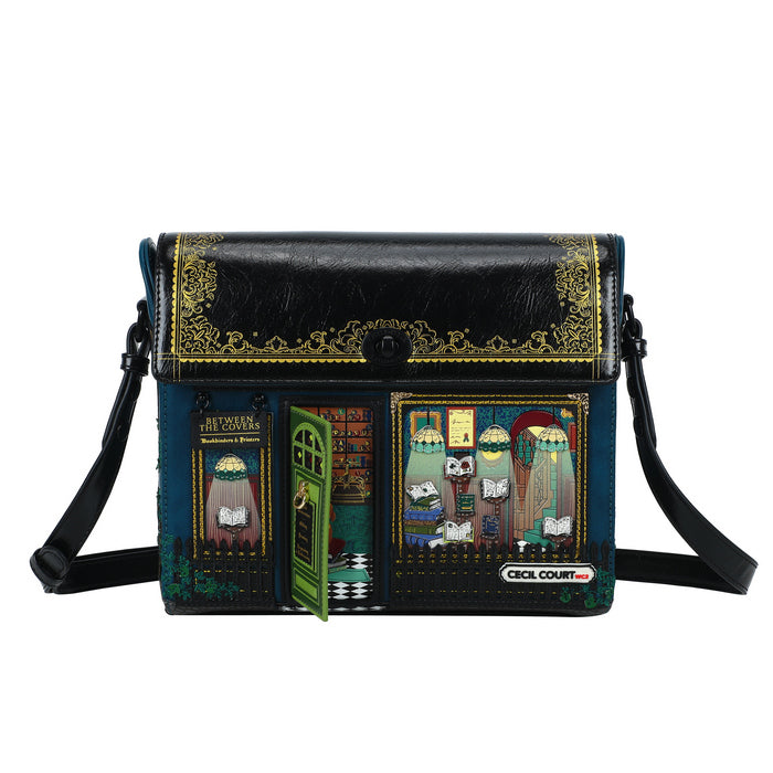Black leather handbag with decorative designs and a visible brand name on a white background