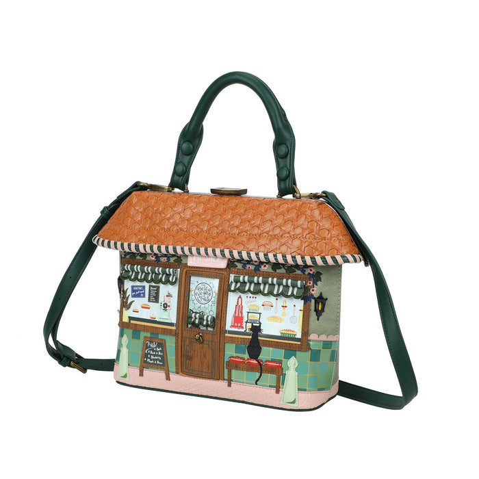 Handbag with a design of a cafe scene on a white background