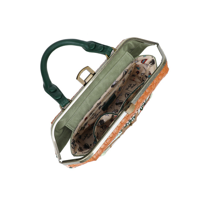 Green handbag with floral interior on a white background