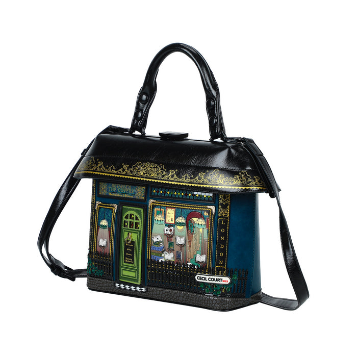 Handbag designed like a pub facade with decorative elements on a white background