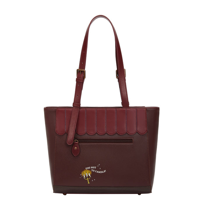 Brown handbag with scalloped edge design and text on a white background