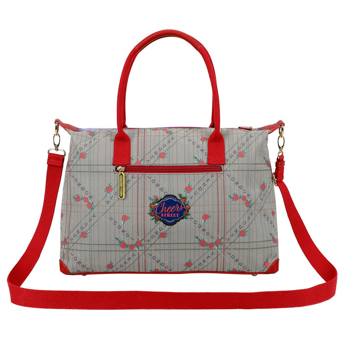 Handbag with red straps and floral pattern on a white background