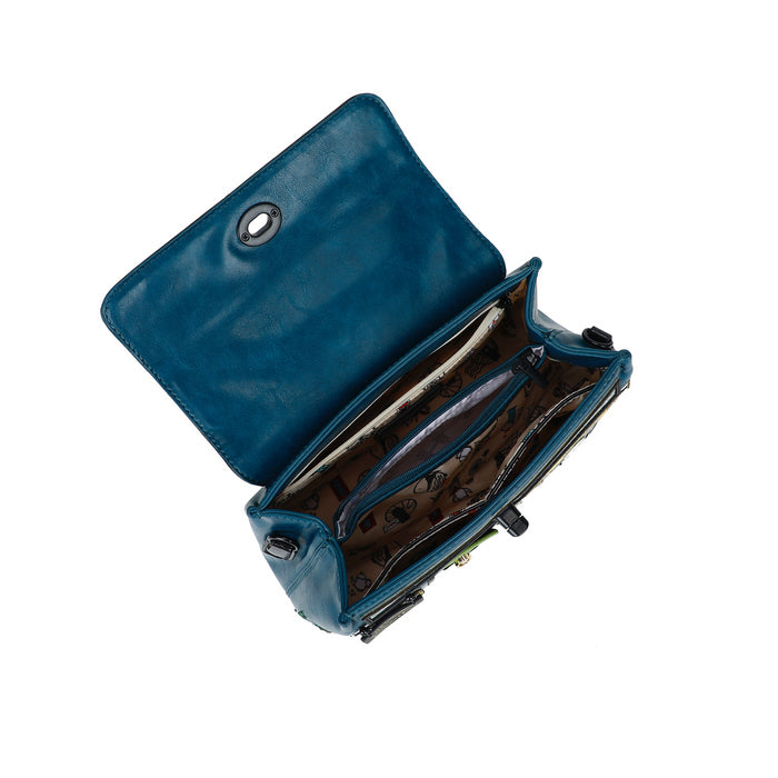 Blue leather handbag with open flap on a white background