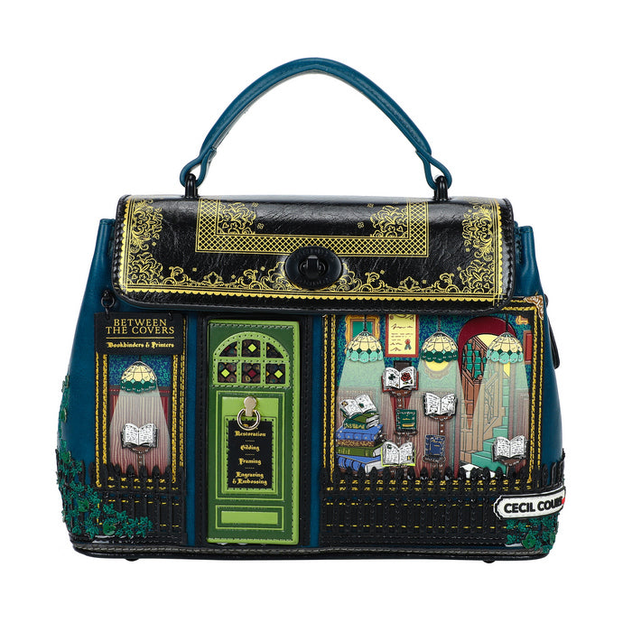 Handbag with artistic design of buildings and windows on a white background