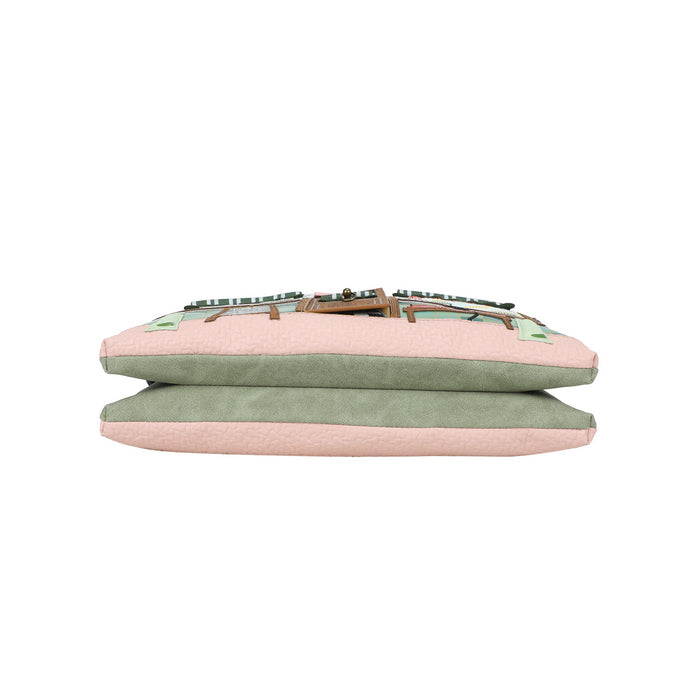 Stack of pink and green fabric items on a white background