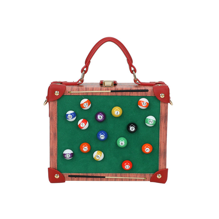 Handbag designed like a pool table with billiard balls on a white background