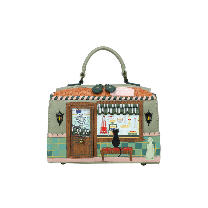Handbag designed like a quaint cafe with a cat illustration on a white background