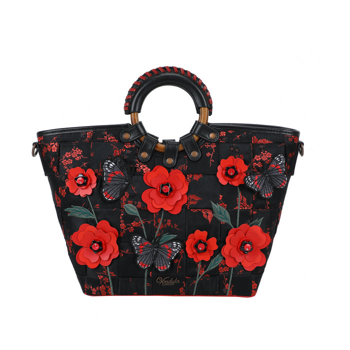 Black handbag with red floral and butterfly design on a white background
