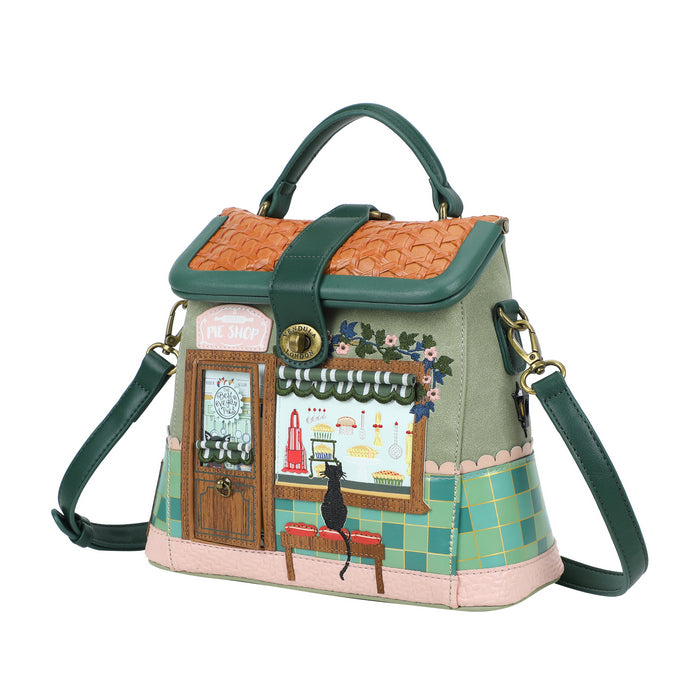 Handbag with a detailed design of a cafe scene on a white background