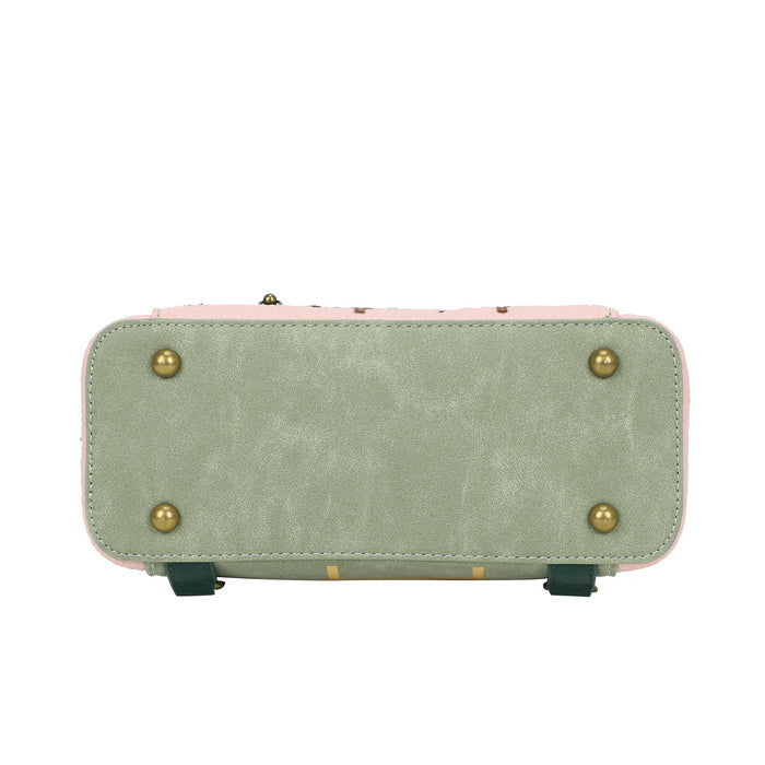 Green handbag with gold studs on a white background