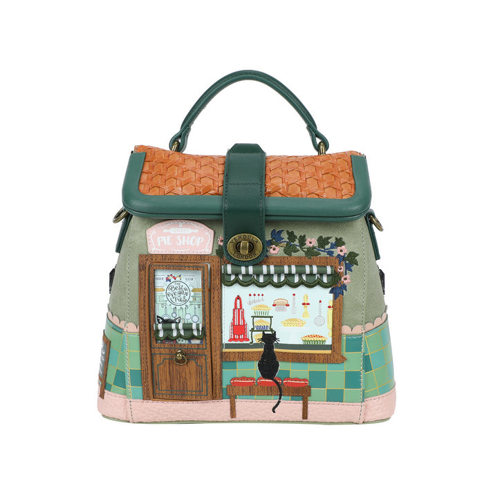 Handbag with a decorative design of a cafe scene on a white background