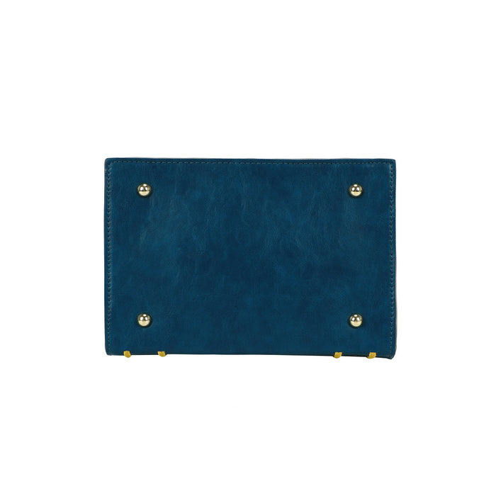 Blue leather clutch with gold studs on a white background