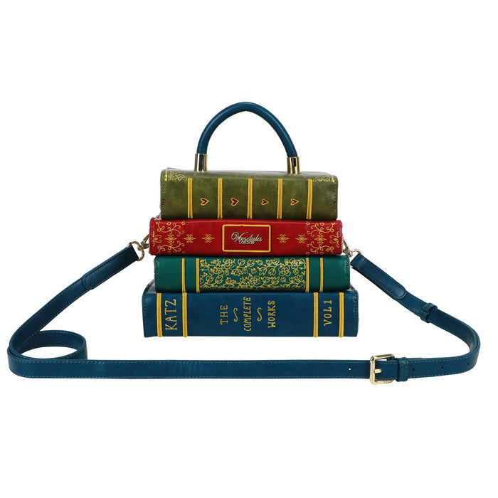 Book-shaped handbag with a strap on a white background