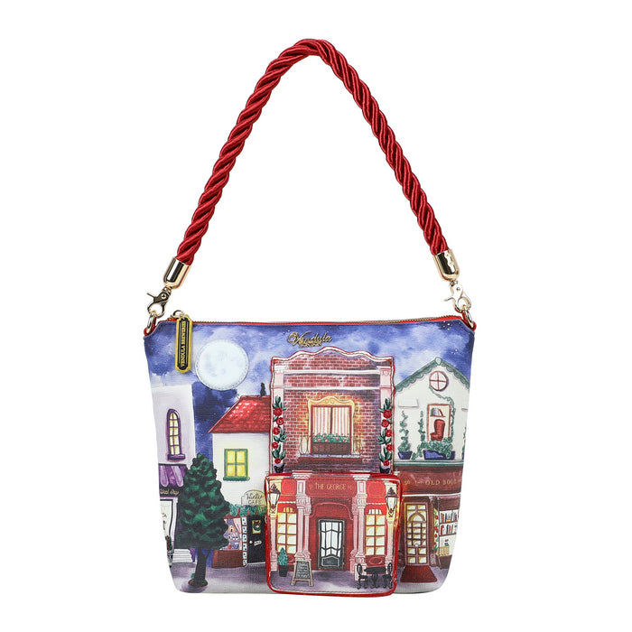 Handbag with a colorful street scene design and red handle on a white background