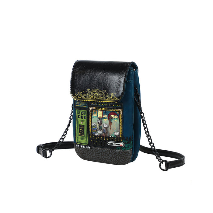 Black and blue crossbody bag with decorative elements on a white background