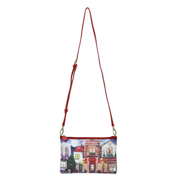 Crossbody bag with a colorful street scene design on a white background