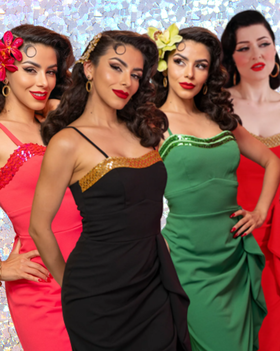 Four women in colorful dresses posing together against a glittery background