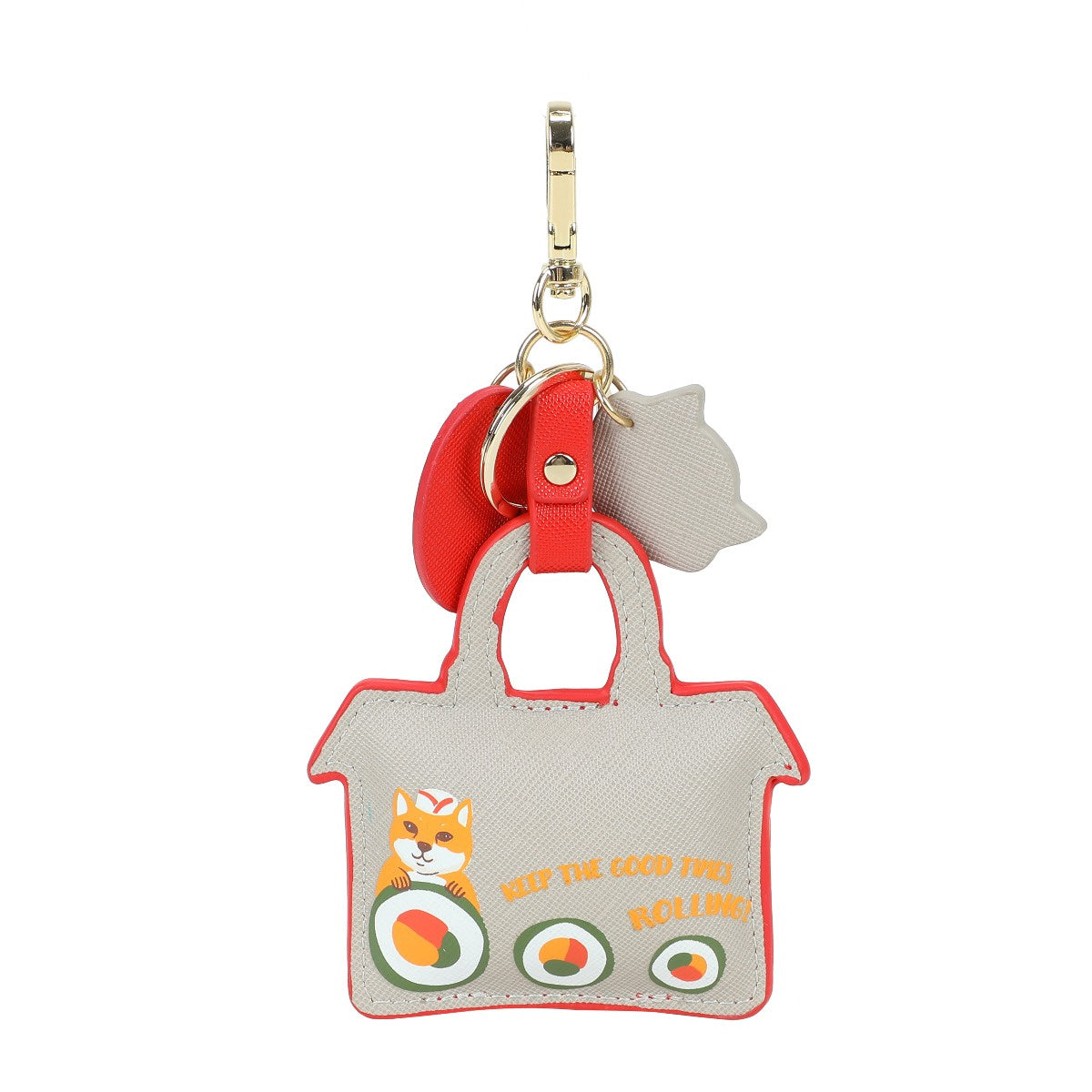 Keychain shaped like a small house with a fox and sushi design on a white background