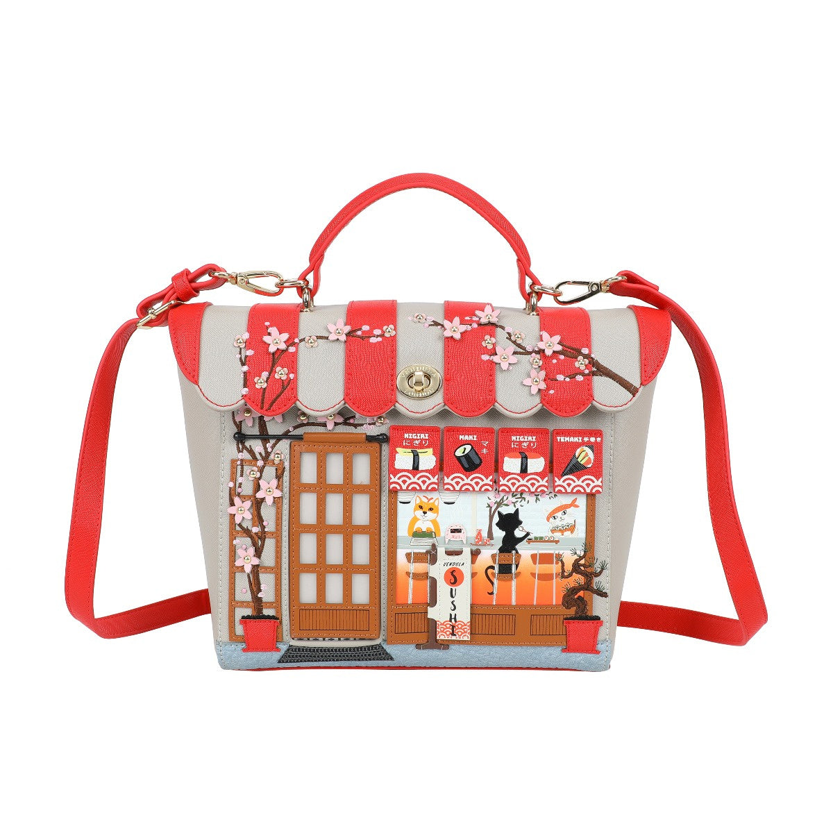 Handbag with a design of a building and cherry blossoms on a white background