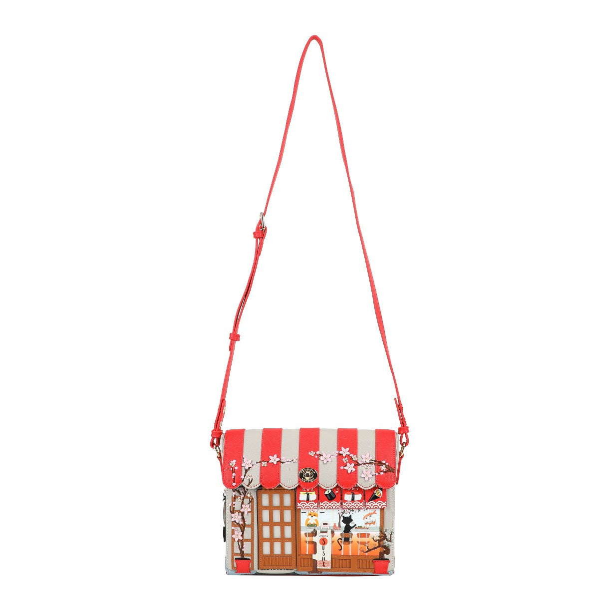 Crossbody bag with a detailed design on a white background